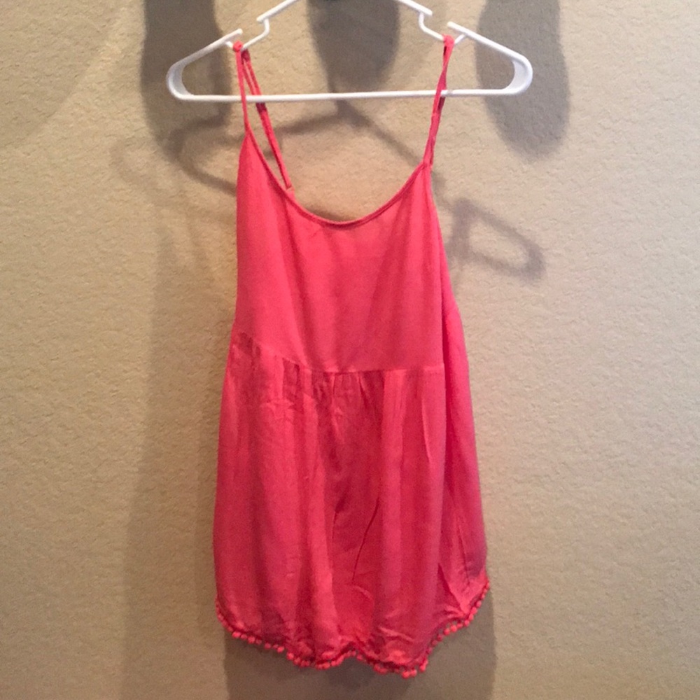 Pink romper with pompom ball fringe!